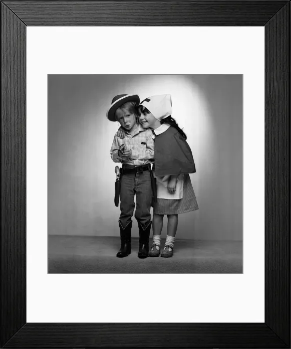 Framed Print : Four year olds, Angus Wood and Danielle Colls dressed as cowboy and nurse Framed Print : Four year olds, Angus Wood and Danielle Colls dressed as cowboy and nurse