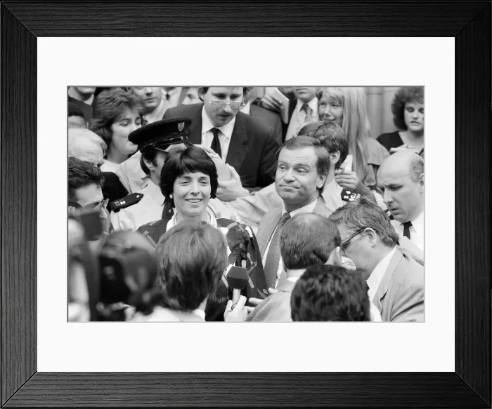 Framed Print : Mary and Jeffrey Archer show their delight in the crowd outside the High Court as they