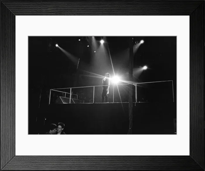 Framed Print : Rock group U2 in concert in USA. Bono on stage. May 1987 Framed Print : Rock group U2 in concert in USA. Bono on stage. May 1987