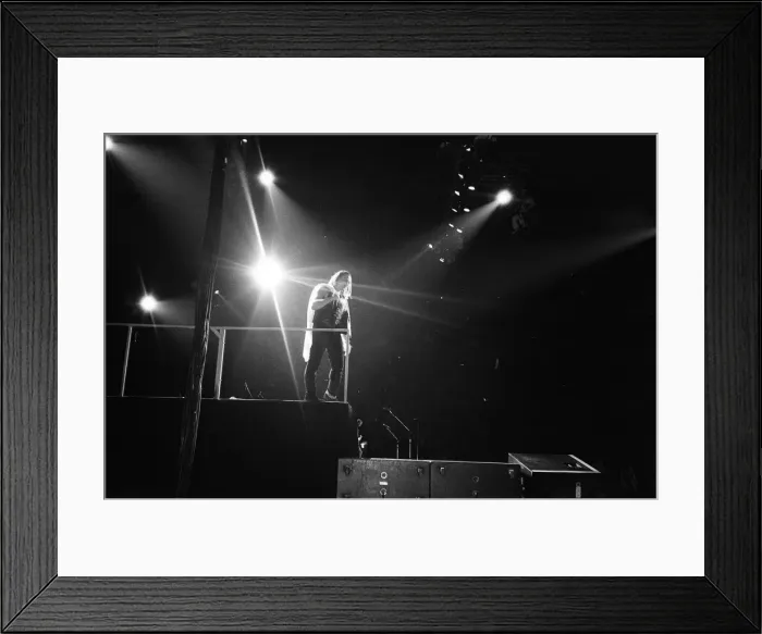 Framed Print : Rock group U2 in concert in USA. Bono on stage. May 1987 Framed Print : Rock group U2 in concert in USA. Bono on stage. May 1987