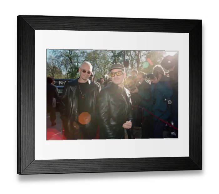 Framed Print : Adam Clayton and Bono of U2 arriving at The Park Lane Hotel for the Q Magazine Awards