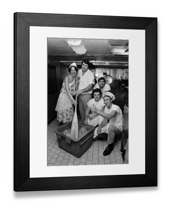 Framed Print : Miss Cleveland stirs Christmas pud. 1976