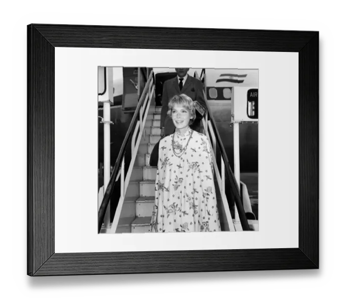 Framed Print : Mia Farrow arrives at Heathrow Airport from Delhi after visiting the Maharishi meditation
