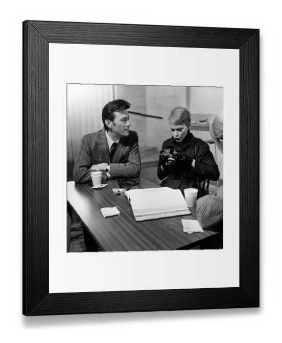 Framed Print : Cast and crew on the set of A Dandy in Aspic. The scene is representing a checkpoint in