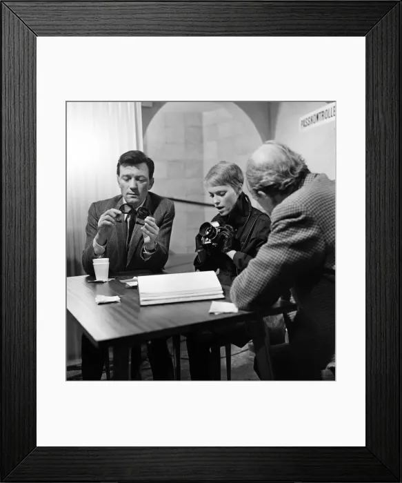 Framed Print : Cast and crew on the set of A Dandy in Aspic. The scene is representing a checkpoint in