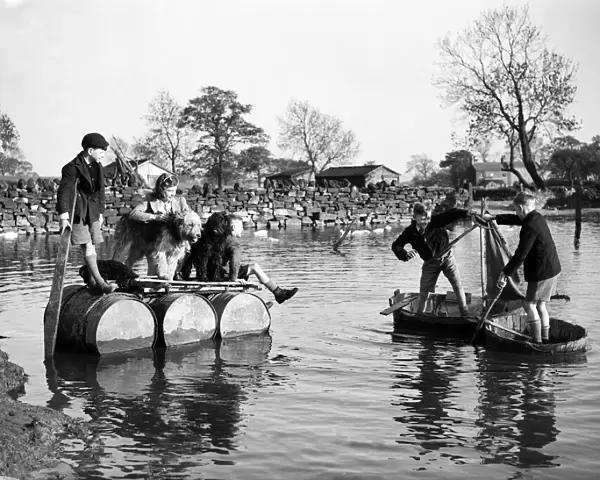 Boys on rafts and tin-bath boats. Circa 1946
