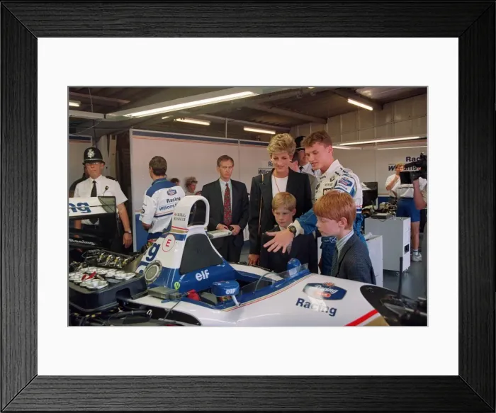 Framed Print : PRINCESS DIANA WEARING A BLACK SUIT WITH HER SON, PRINCE HARRY