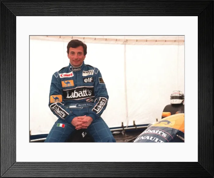 Framed Print : RICARDO PATRESE, MOTOR RACING DRIVER, AT SILVERSTONE SITTING BESIDE CAR WEARING RACING Framed Print : RICARDO PATRESE, MOTOR RACING DRIVER, AT SILVERSTONE SITTING BESIDE CAR WEARING RACING