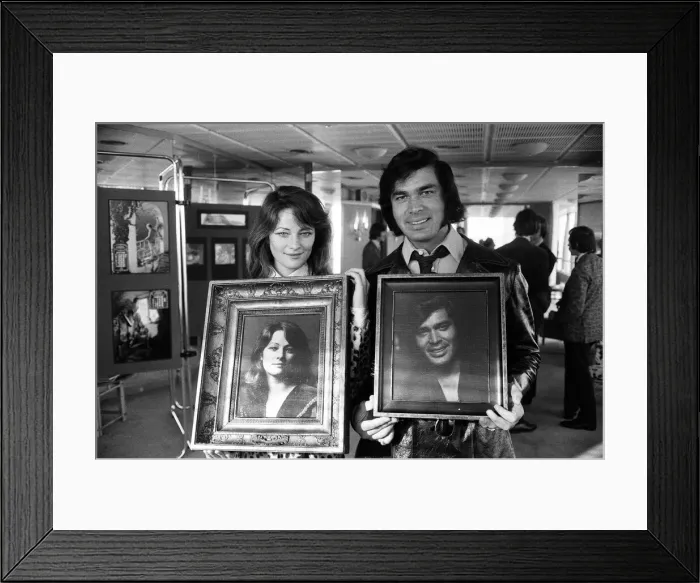 Framed Print : Charlotte Rampling and Engelbert Humperdinck with their portraits at a celebrity portrait Framed Print : Charlotte Rampling and Engelbert Humperdinck with their portraits at a celebrity portrait