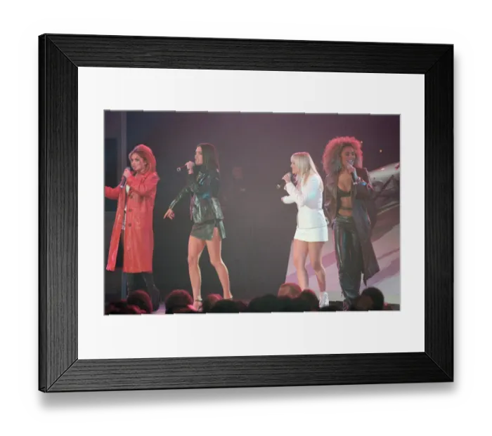 Framed Print : Spice Girls at Alexandra Palace in London to help launch new McLaren MP4 12 Formula One