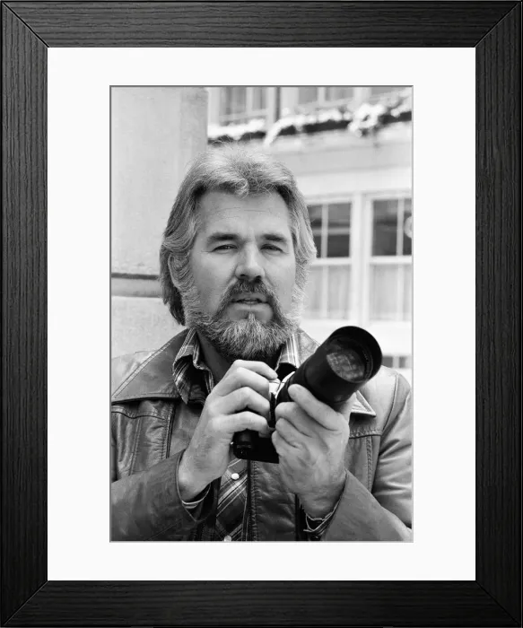 Framed Print : Recording star Kenny Rogers, a keen amateur photographer, pictured in London Framed Print : Recording star Kenny Rogers, a keen amateur photographer, pictured in London