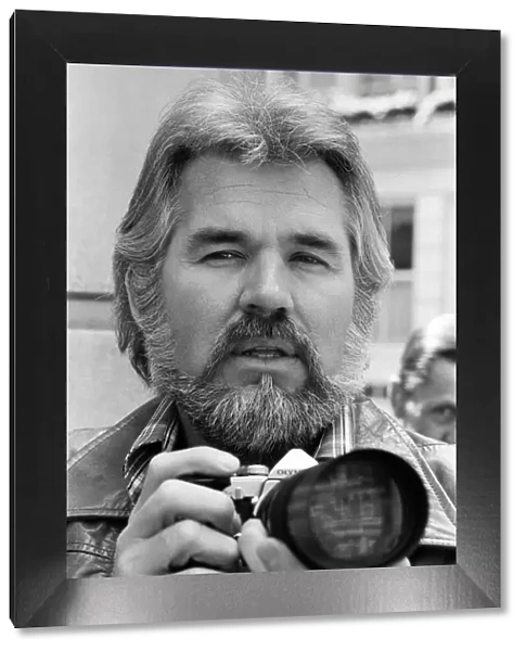 Recording star Kenny Rogers, a keen amateur photographer, pictured in London