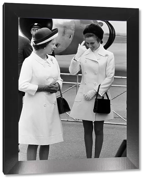 The Queen and Princess Anne waiting to board the plane for a 10 day visit to Canada