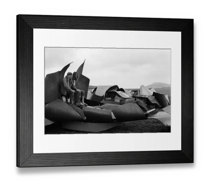 Framed Print : Isle of Wight Festival. Two Swedish hippy types sitting on top of cars that look like Framed Print : Isle of Wight Festival. Two Swedish hippy types sitting on top of cars that look like