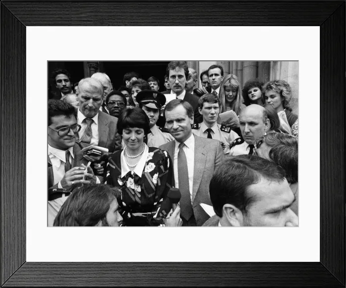 Framed Print : Mary and Jeffrey Archer show their delight in the crowd outside the High Court as they Framed Print : Mary and Jeffrey Archer show their delight in the crowd outside the High Court as they