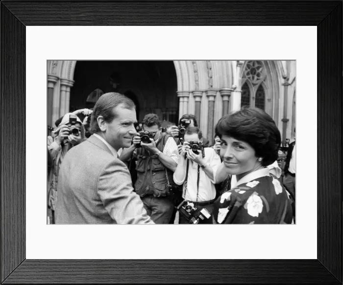 Framed Print : Mary and Jeffrey Archer show their delight in the crowd outside the High Court as they Framed Print : Mary and Jeffrey Archer show their delight in the crowd outside the High Court as they