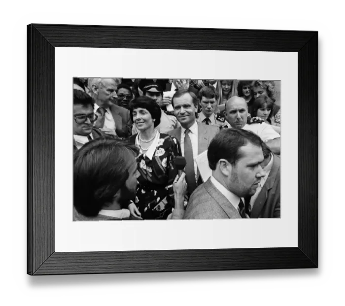 Framed Print : Mary and Jeffrey Archer show their delight in the crowd outside the High Court as they
