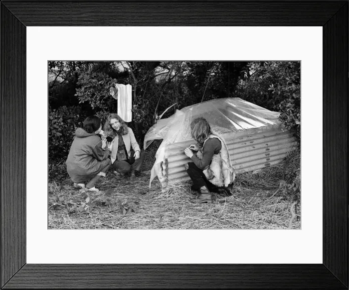 Framed Print : Isle of Wight Festival. A girl combing her hair. Left to right, Jutta Leidel, aged 17 Framed Print : Isle of Wight Festival. A girl combing her hair. Left to right, Jutta Leidel, aged 17
