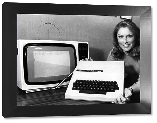 Marketing assistant Wendy Barker with the computer that has filled Dragon