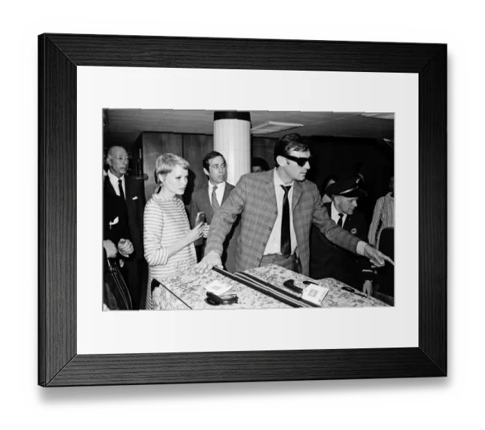 Framed Print : Arrivals at Heathrow Airport from Berlin. Actress Mia Farrow and actor Laurence Harvey Framed Print : Arrivals at Heathrow Airport from Berlin. Actress Mia Farrow and actor Laurence Harvey