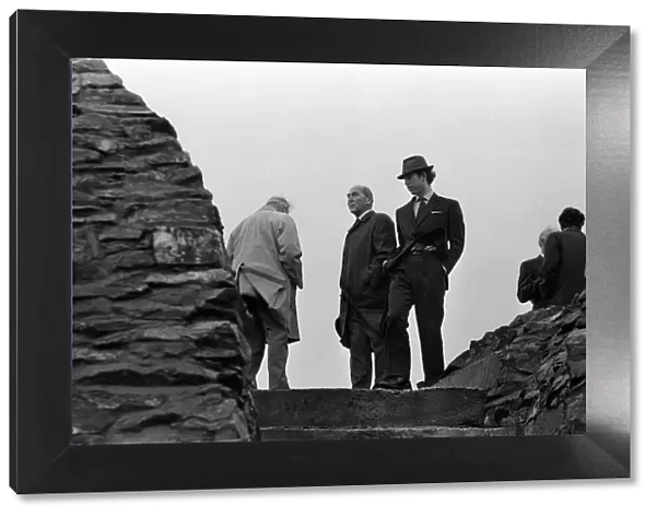 Charles, Prince of Wales visits North Wales. The Prince climbs Moel Famau