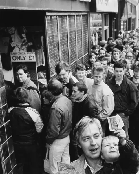 Glasgow Rangers fans queue for tickets for the Old Firm clash with Celtic