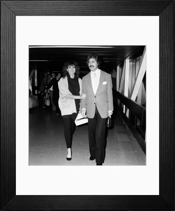 Framed Print : Engelbert Humperdinck and his daughter Louise, 18, arrive at Heathrow for a family