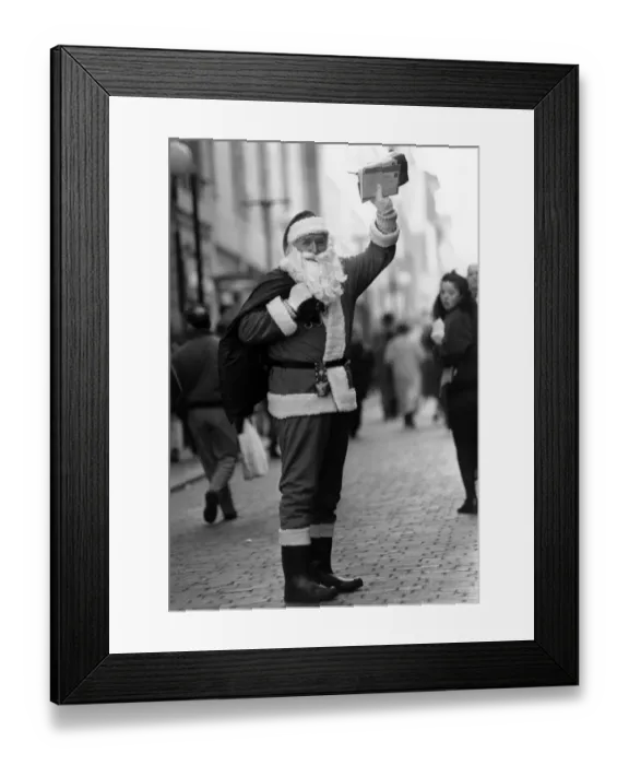 Framed Print : Postman Ronnie Taylor on his round as Father Christmas. Workmates at the Central Delivery Framed Print : Postman Ronnie Taylor on his round as Father Christmas. Workmates at the Central Delivery