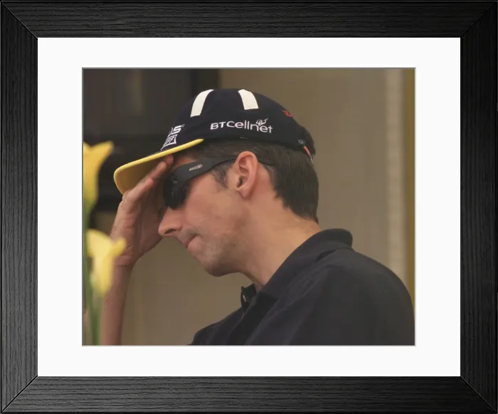 Framed Print : Damon Hill ponders his future over lunch July 1999 in the Jordan motor home