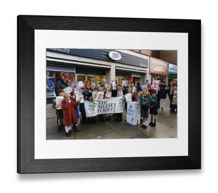 Framed Print : Schoolchildren using old Christmas cards to spread the message about recycling Framed Print : Schoolchildren using old Christmas cards to spread the message about recycling
