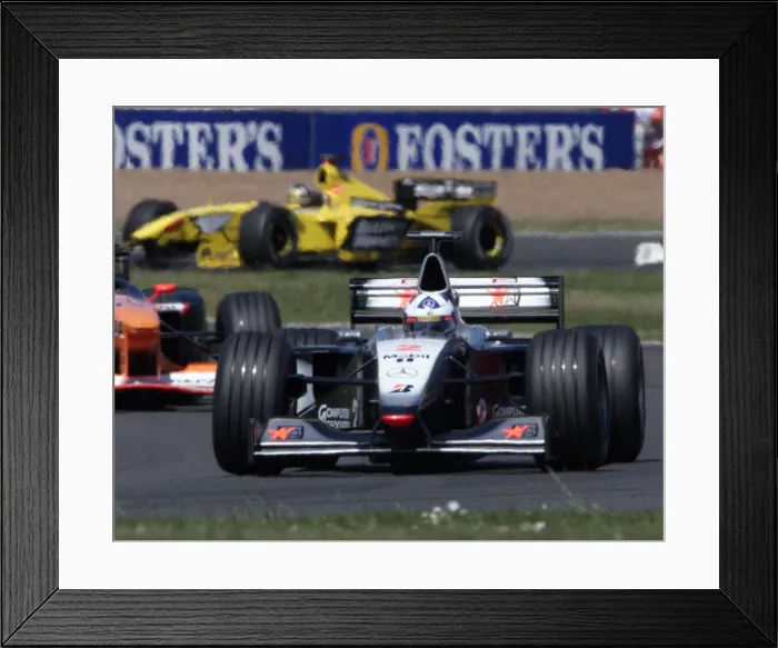Framed Print : David Coulthard leading the British Grand Prix July1999 with David Coulthard in Framed Print : David Coulthard leading the British Grand Prix July1999 with David Coulthard in