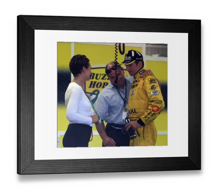 Framed Print : Damon Hill and wife Georgie July 1999 at the end of the 1999 British Grand Prix