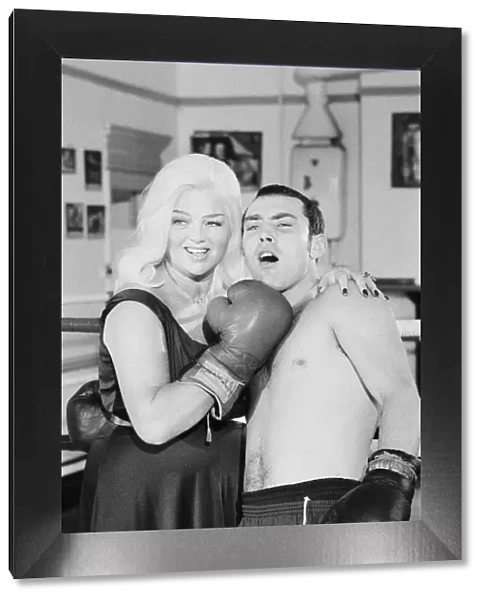 Former Middleweight Champion Alan Minter with singer and Actress Diana Dors at The Thomas