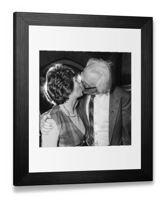 Framed Print : Michael Foot kissing wife JIll Craigie - Novemer 1980 ----- Framed Print : Michael Foot kissing wife JIll Craigie - Novemer 1980 -----
