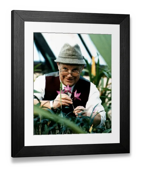 Framed Print : Jim McColl Beechgrove Garden television presenter with flowers tweed hat glasses