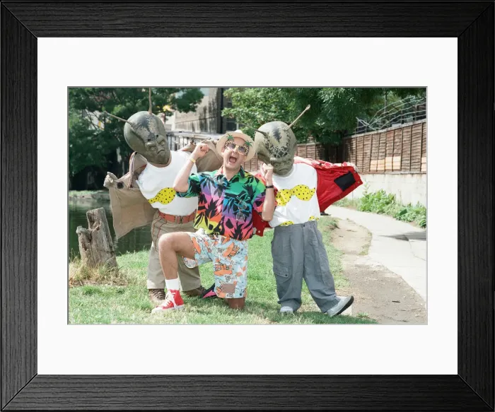 Framed Print : Chart topper Timmy Mallett with two martians sporting itsy bitsy bikinis Framed Print : Chart topper Timmy Mallett with two martians sporting itsy bitsy bikinis