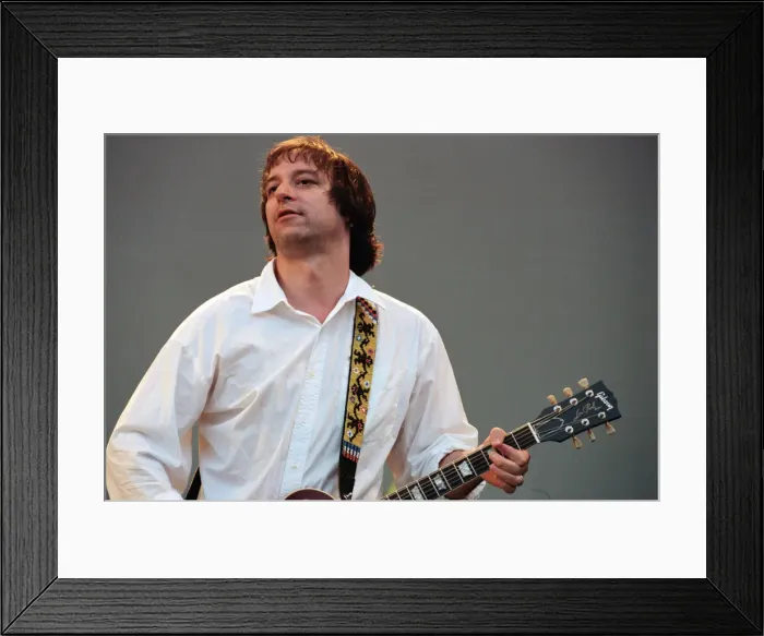 Framed Print : Picture shows guitarist Peter Buck. REM pictured performing in Germany in