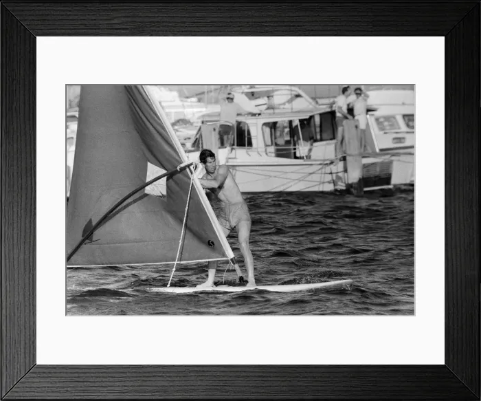 Framed Print : Prince Charles pictured windsurfing near Perth during his visit to Australia. March 1979 Framed Print : Prince Charles pictured windsurfing near Perth during his visit to Australia. March 1979