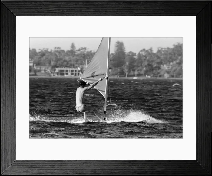 Framed Print : Prince Charles pictured windsurfing near Perth during his visit to Australia. March 1979 Framed Print : Prince Charles pictured windsurfing near Perth during his visit to Australia. March 1979
