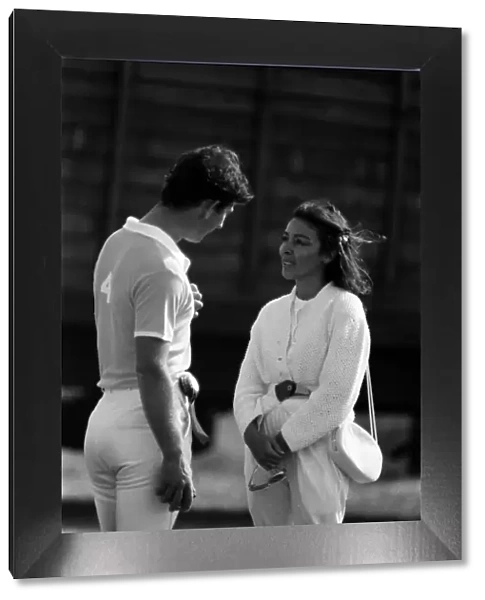 Prince Charles talking to a woman during a polo match. May 1980