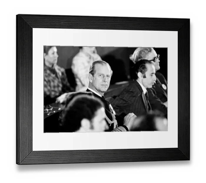 Framed Print : Prince Philip, Duke of Edinburgh listens to the Queen