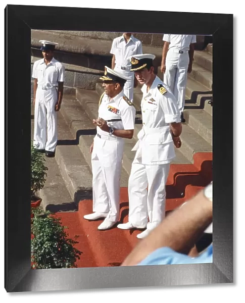 Prince Charles pictured during his tour of India, wearing white Navy uniform