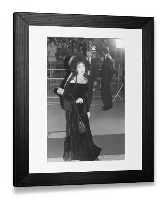 Framed Print : Cher attending the premiere of the film Empire of the Sun in London