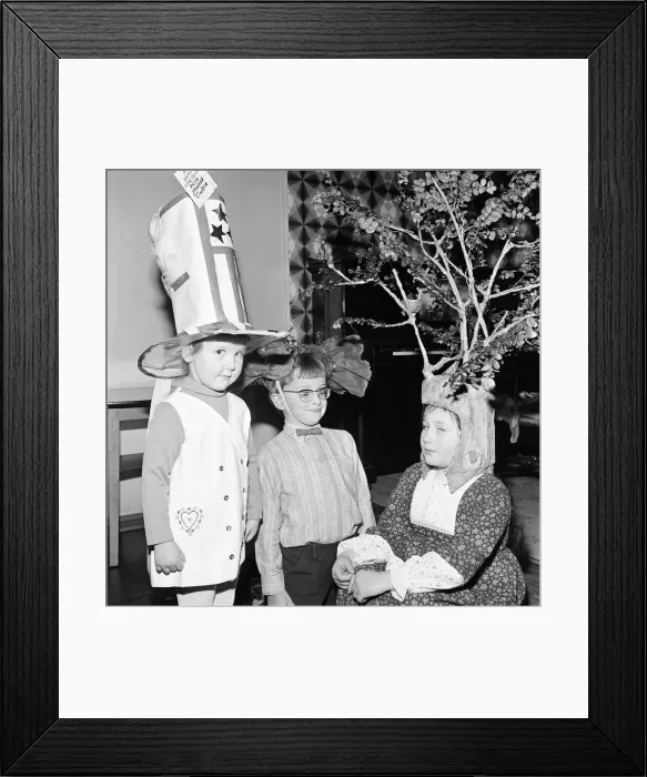 Framed Print : Children compete in a Fancy Hat Competition, Teesside, North East England, January 1974 Framed Print : Children compete in a Fancy Hat Competition, Teesside, North East England, January 1974