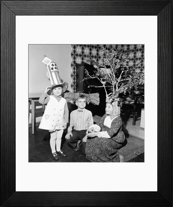 Framed Print : Children compete in a Fancy Hat Competition, Teesside, North East England, January 1974 Framed Print : Children compete in a Fancy Hat Competition, Teesside, North East England, January 1974