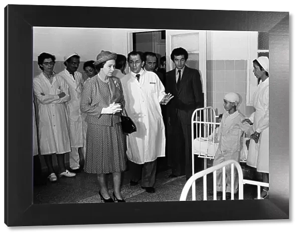 Queen Elizabeth II visits the victims of El Asnam earthquake in hospital in Algiers