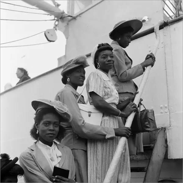 Nearly 700 West Indian men, women and children arrive at Plymouth on SS Auriga in a mass
