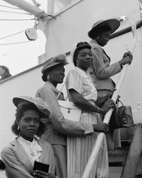 Nearly 700 West Indian men, women and children arrive at Plymouth on SS Auriga in a mass