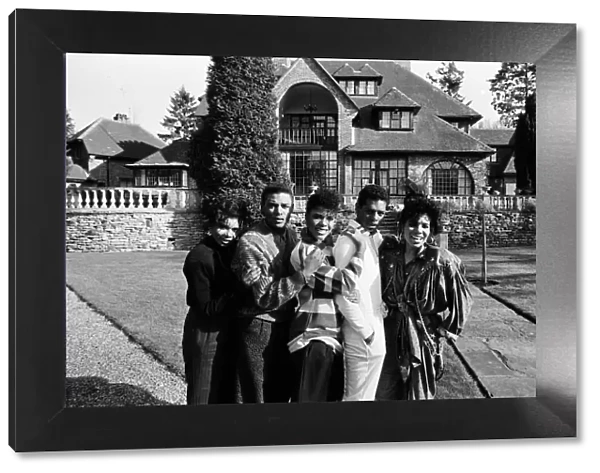 Pop group Five Star outside their new home Stone Court in Berkshire. March 1987