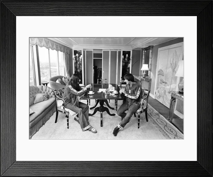 Framed Print : Sonny Bono & Cher, American music duo, pictured in their rooms at the Royal Garden Hotel Framed Print : Sonny Bono & Cher, American music duo, pictured in their rooms at the Royal Garden Hotel